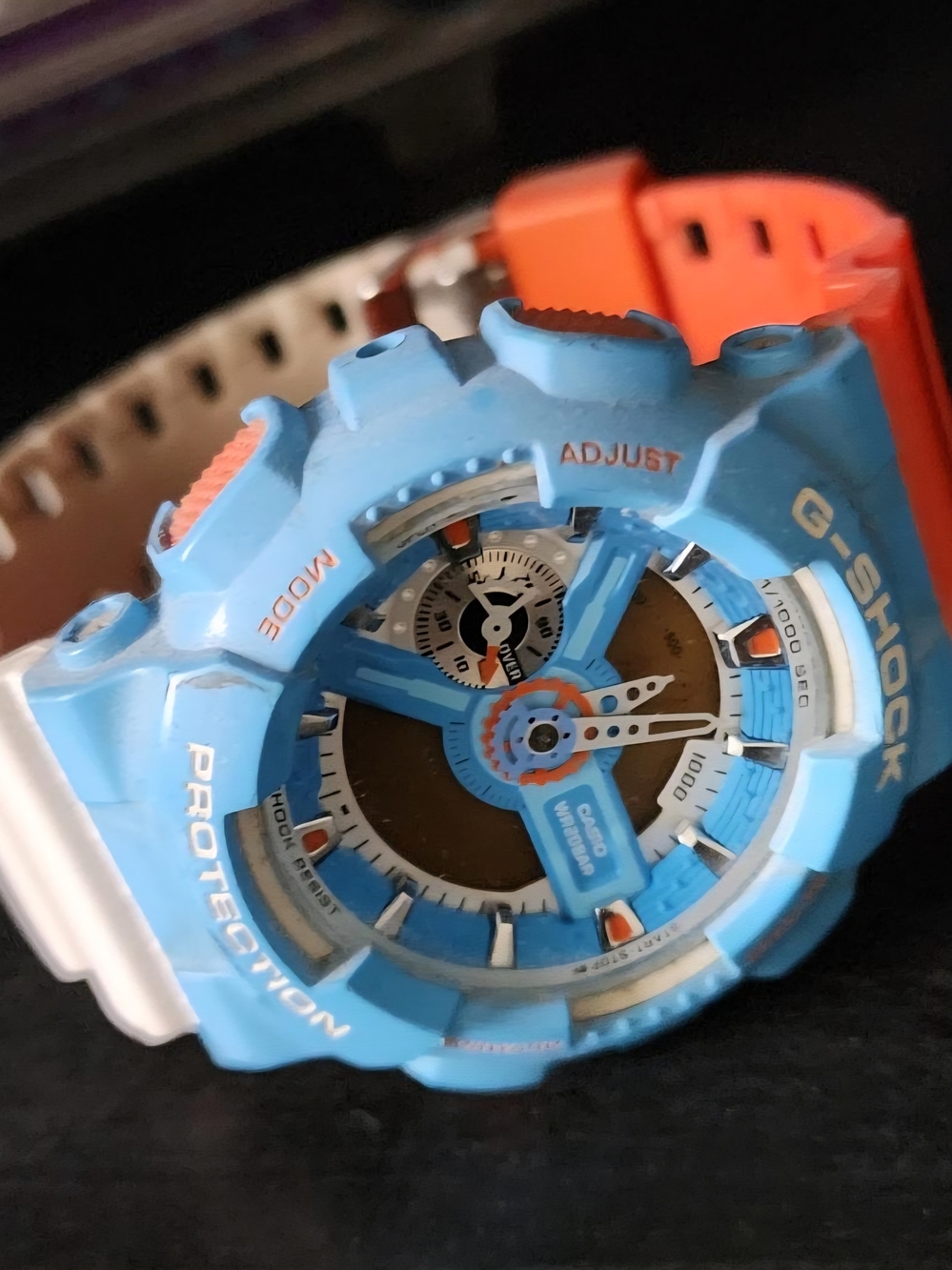 Casio G-Shock GA-110NC-2A watch, brightly colored, dual-tone multi-colored